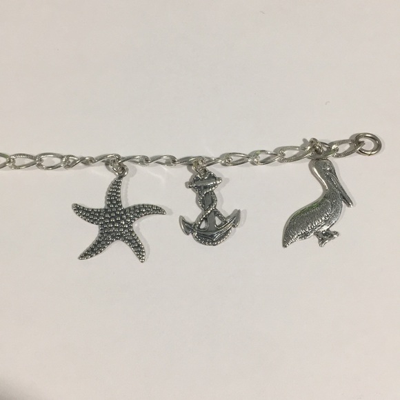 Sterling Silver Bracelet With 7 Different Charms - Picture 5 of 7